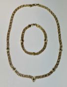 18CT GOLD FANCY LINK NECKLACE & MATCHING BRACELET, set with tiny white stones & small round
