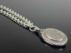 VICTORIAN SILVER HOLLOW BARREL LINK COLLARETTE, supporting a foliate engraved oval picture locket,