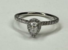 GIA CERTIFICATED PEAR CUT DIAMOND RING, central stone approx. 0.3cts, graded as E in colour, SI1,