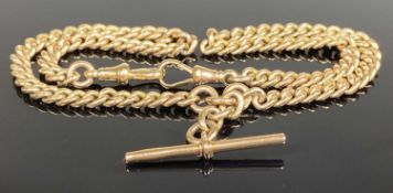 9CT GOLD CURB LINK DOUBLE WATCH ALBERT, centred with a T-bar and with two spring clips, 39cms (l),