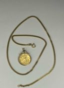 EDWARD VII SOVEREIGN, 1907, mounted as a pendant in 9ct gold, 9.4g, suspended from an 18ct gold curb