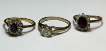 SAPPHIRE & DIAMOND CLUSTER RING in 18ct gold, size K, 3.1gms, with two decorative 9ct gold gem set