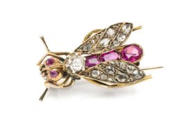 VICTORIAN YELLOW METAL BEE BROOCH, the insect set with old-cut diamonds and rubies, 3cms long, 4.