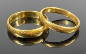 TWO 22CT GOLD WEDDING RINGS, the first size T, 4.6gms, the second size U, 5.0gms (2) Provenance: