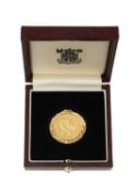 RARE WELSH GOLD SOVEREIGN MEDALLION, 1989, later mounted in 9ct gold laurel wreath pendant frame,