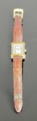 KRONOS ELEGANCE YELLOW & WHITE METAL CASED LADIES' WRISTWATCH, cabochon set winder, on leather strap