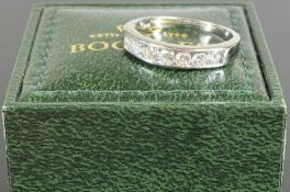 DIAMOND SEVEN-STONE HALF-ETERNITY RING, by Boodle & Dunthorne, brilliant cut stones totalling