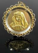 18CT GOLD LOURDES OUR LADY OF SORROWS PENDANT, 35mms (l), 7.5g Provenance: private collection