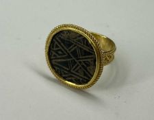 MUSÉON ART ANTIQUE ROMAN BRONZE RING HEAD, newly mounted in 21ct gold, size O, gross weight 8.2g,