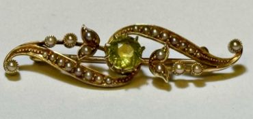 EDWARDIAN 15CT GOLD PERIDOT & SEED PEARL BROOCH, 40mms, 3.8gms Provenance: private collection Conwy