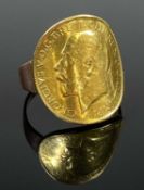 SOVEREIGN RING, the shaped coin mounted on a 9ct ring, size R, 9.3gms Provenance: private collection