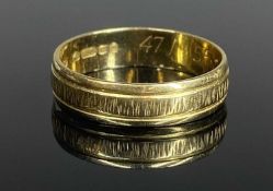 18CT GOLD TEXTURED WEDDING RING, size O, 3.2g Provenance: private collection Flintshire