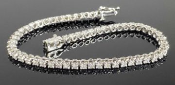 DIAMOND LINE BRACELET, set with 60 brilliant cut diamonds, totalling approx. 2ct, set in 18ct