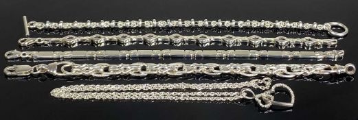 FOUR MODERN SILVER BRACELETS, and a silver conjoined hearts pendant necklace (5) Provenance: private