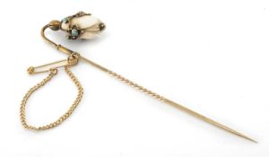 SHELL & TURQUOISE FLOWER STICKPIN, carved as a snowdrop, set in yellow metal presumed 9ct gold,