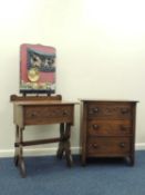 SMALL OAK MIRROR BACK DRESSING TABLE with carved single drawer, and matching three-drawer chest (