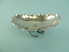 CHINESE WHITE METAL OPEN SALT, form of a water lily, on stem-form base, 4 x 10 x 6.5cms
