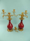 19TH CENTURY FRENCH EMPIRE STYLE CANDELABRA, Sang De Boeuf porcelain bases (restored), with gilded