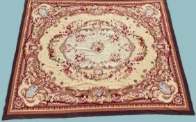 AUBUSSON STYLE WOOLLEN TAPESTRY CARPET, 20th century, with ivory and fawn floral garland field,