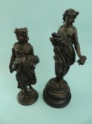 TWO LATE 19TH CENTURY BRONZED SPELTER FIGURES of maidens with flowers, one having circular