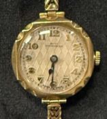 LADIES' 9CT GOLD-CASED BRACELET WRISTWATCH, the dial signed 'Batty, Manchester', gross weight 19.