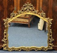 GILT FRAMED OVERMANTEL MIRROR in the Rococo style, modern, 116 (h) x 120cms (w) Provenance: