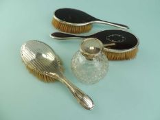 TWO SILVER AND MOTHER OF PEARL BACKED HAIRBRUSHES, another silver backed hairbrush, and a globular