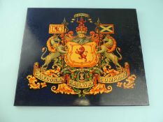 RECTANGULAR WOODEN PLAQUE with transferware crest of Caledonian Railway Company, 34.5 x 41cms