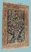 KASHAN STYLE TREE OF LIFE WOOLLEN RUG, 20th century, dark blue field dispersed with birds amidst the