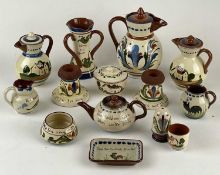 COLLECTION OF DEVON MOTTO WARE, including three lidded jugs, three-handled vase, two match