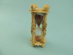 RARE 19TH CENTURY BONE EGG TIMER, 9cms (h) Provenance: private collection Merseyside