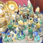 QUANTITY OF CHINESE GLAZED POTTERY FIGURAL PEN RESTS, and number of similar figures of Daoist