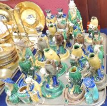 QUANTITY OF CHINESE GLAZED POTTERY FIGURAL PEN RESTS, and number of similar figures of Daoist