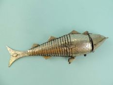 SILVER PLATED BESAMIM with articulated body, hinged head with hook clasp, 18cms (l) Provenance: