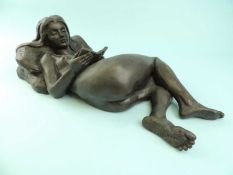 BRONZED RESIN LIMITED EDITION (406/500) STATUE of reclining nude female reading a book, 37cms (l)