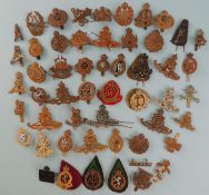 QUANTITY OF ASSORTED MILITARY CAP BADGES, including Royal Army Veterinary Corps, Queen Mary's Army