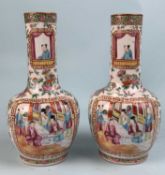 PAIR OF CHINESE FAMILLE ROSE PORCELAIN BOTTLE VASES, decorated in the Canton tradition, late 19th