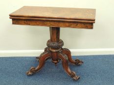 VICTORIAN BURR WALNUT FOLDING PEDESTAL CARD TABLE, c. 1850, swivel folding top over a carved