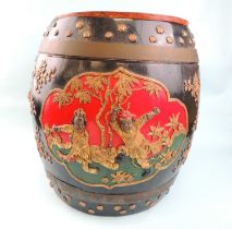 CHINESE PAINTED WOOD RICE BARREL, 20th century, the ebonised and gilded body with friezes