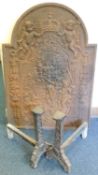 CONTINENTAL CAST-IRON FIREBACK, cast with figures before a city and date 'Anno 1695', 104 x 73cms;