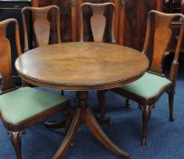 SET OF FOUR WALNUT DINING CHAIRS in the Queen Anne style; together with a circular walnut pedestal