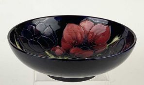 MOORCROFT CIRCULAR FOOTED BOWL, anemone pattern by Walter Moorcroft, impressed marks and monogram to