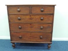VICTORIAN MAHOGANY CHEST OF DRAWERS, turned knob handles, on turned supports, 116 (h) x 111 (w) x