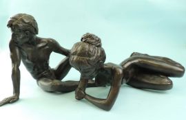 PAIR OF BRONZED RESIN LIMITED EDITION STATUES - seated nude male holding a book (317/500), 25cms (