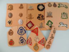 NUMBER OF MILITARY CAP BADGES, including 14th King's Hussars, Dragoon Guards, Staffordshire, and