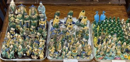 COLLECTION OF CHINESE MUDMEN FIGURES in traditional colours, similar figural pen stands, miniature