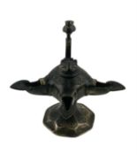 KHORASAN STYLE OIL LAMP with triple burners, cat form hinge cover, and loop handle surmounted with a