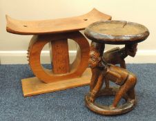 TRADITIONAL ASHANTI CARVED WOOD STOOL, 40 (h) x 52 (w) x 26cms (d); and a West African tribal