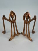 PAIR OF SECESSIONIST STYLE COPPER & BRASS FIRE DOGS, 25cms (h) Provenance: private collection Powys