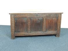 18TH CENTURY JOINED OAK COFFER, hinged two-part lid over triple panel front with carved rails, 61 (